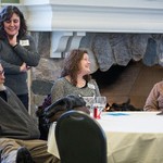 Four people sitting at a table
